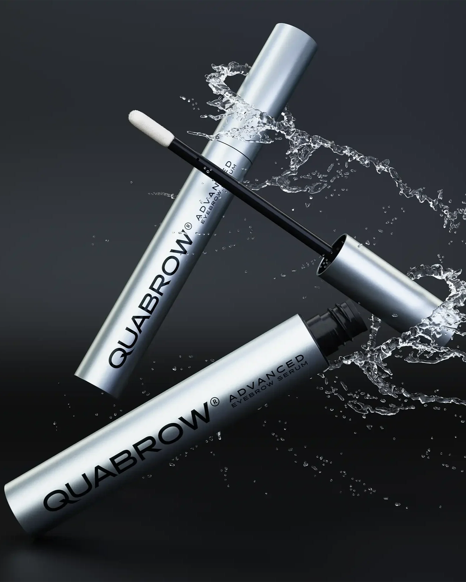 QUABROW Eyebrow Serum DUO SET shown with dynamic water splash effect on a black background