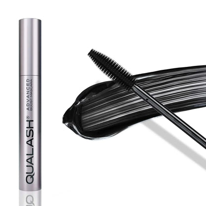 QUALASH mascara brush in close-up with visible black mascara formula stroke on white background